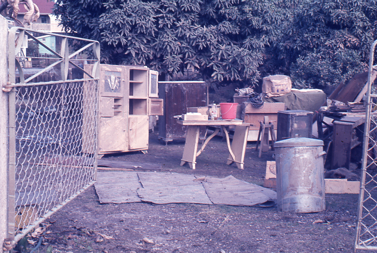 Flood damaged furniture stacked outside a house, 2nd February 1974