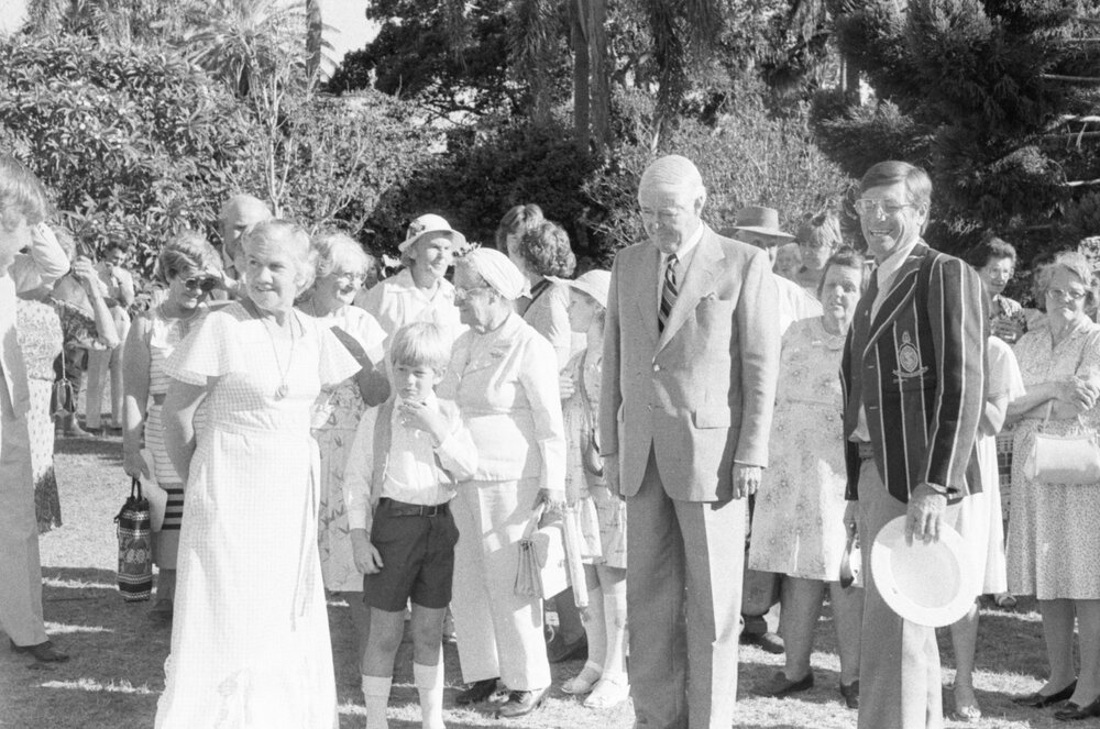 Sir James Ramsay, Governor of Queensland, and unidentified people gathered at the memorial in honour of Mary Aileen Bell, Coochin Coochin, Scenic Rim, April 1980