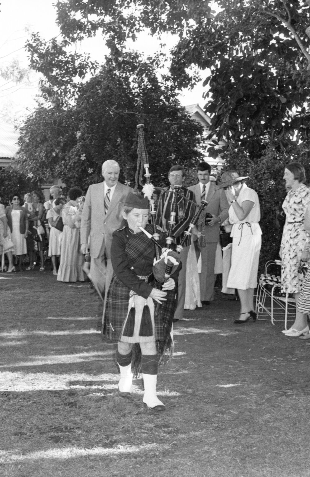 Unidentified bagpipe player playing at the the memorial in honour of Mary Aileen Bell, Coochin Coochin, Scenic Rim, April 1980