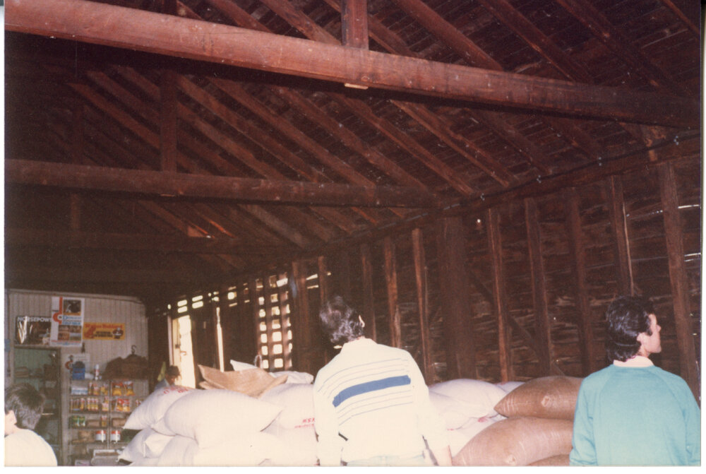 Wide timber boards and bags of stock inside Risson's Produce