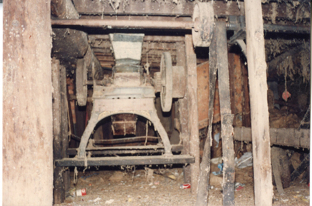 Old machinery in the cellar of Risson's Produce