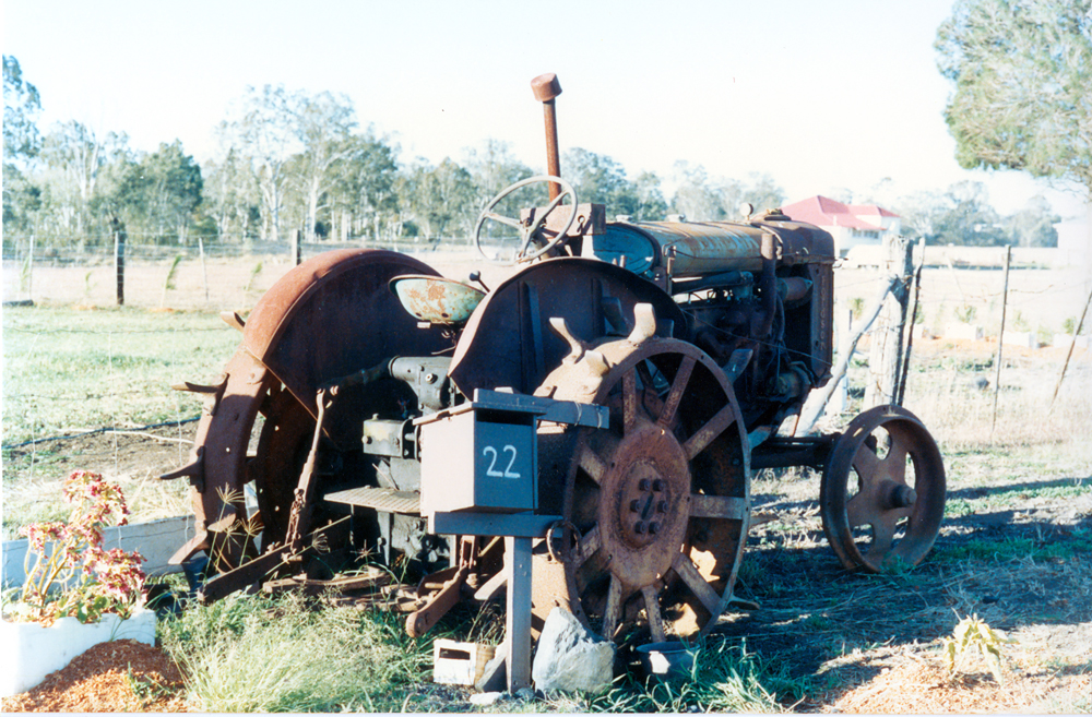 Old tractor in front of 22 White Street, Bundamba, Ipswich, 1991
