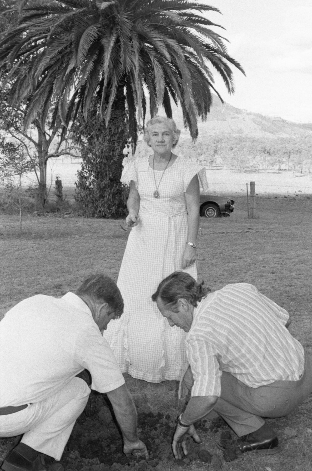 Unidentified people planting a tree at the memorial in honour of Mary Aileen Bell, Coochin Coochin, Scenic Rim, April 1980