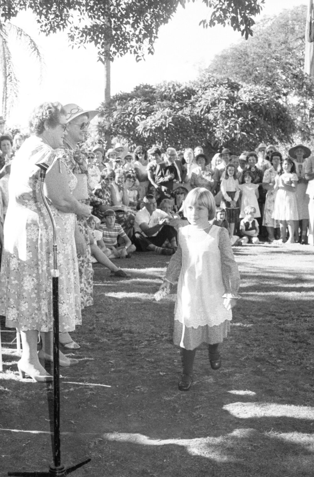 Unidentified girl in a pinafore at the memorial in honour of Mary Aileen Bell, Coochin Coochin, Scenic Rim, April 1980