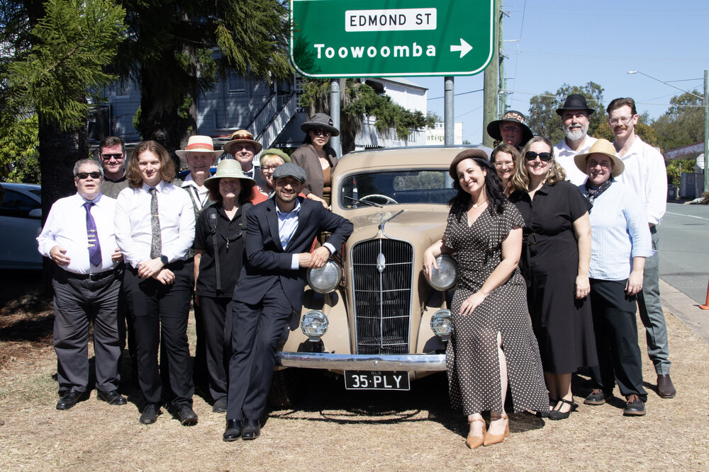 Ipswich City Big Band posing around a vintage Plymouth, Marburg Meander, event held as part of Galvanized: A Festival of Heritage, Marburg, Ipswich, September 2026