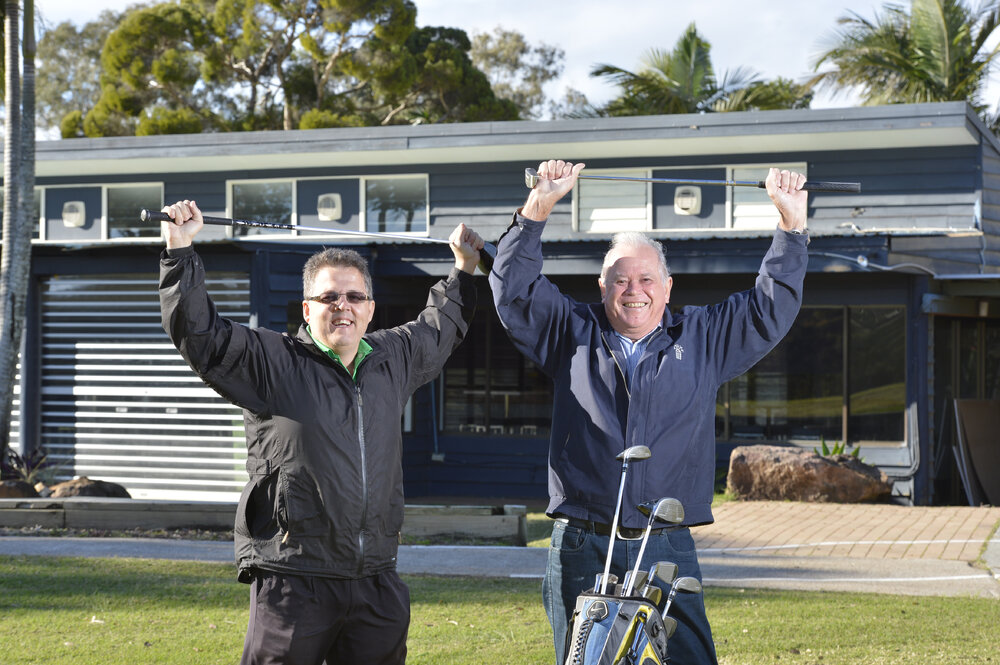 Sandy Gallop and now Karana Downs Golf Clun owner Brett Lawton with original foundation member Ken Parker raise their clubs to the re-opening of the golf course, Ipswich, 24 May 2013