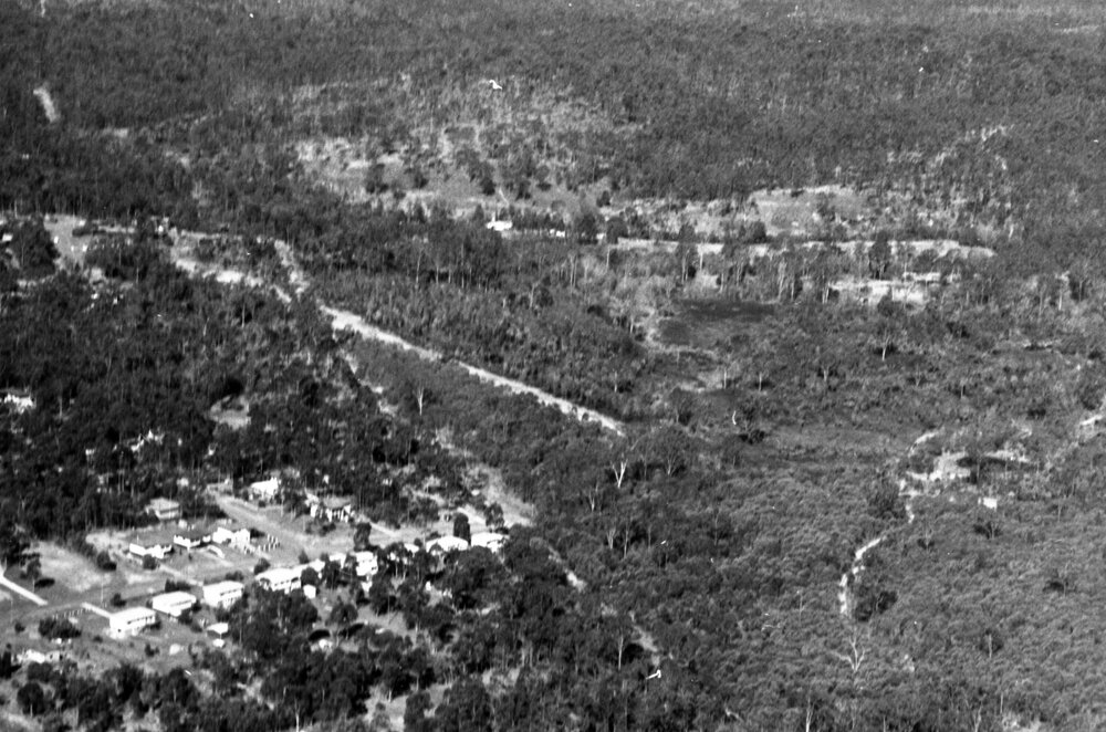 Aerial photography over developing suburbs and a motorway, Ipswich, August 1981