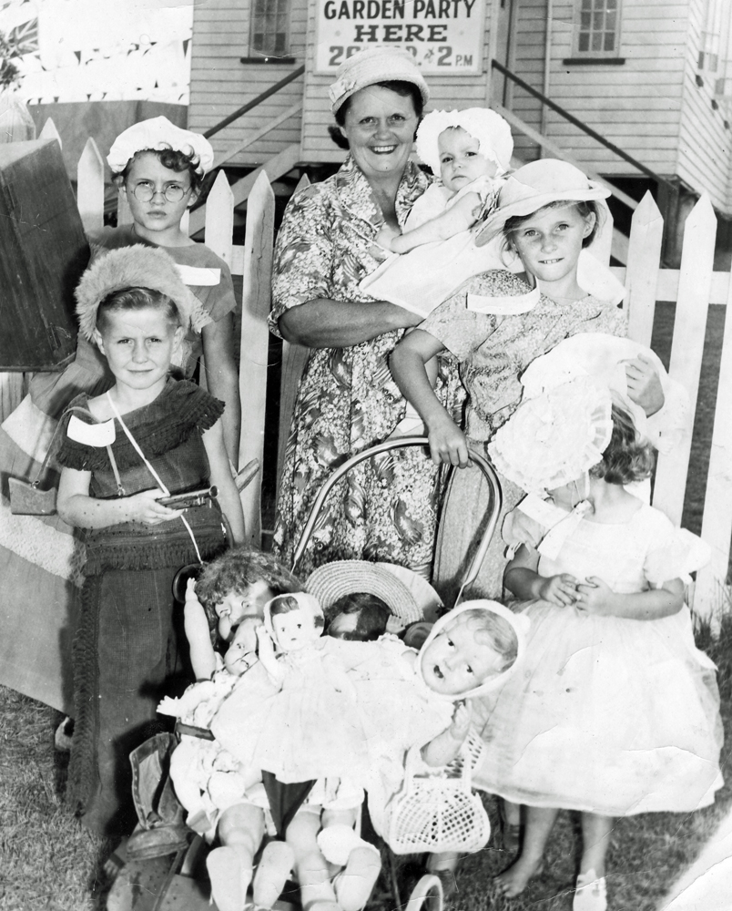 Carmody family in fancy dress at garden party at Baptist Church, Churchill, Ipswich, 1959
