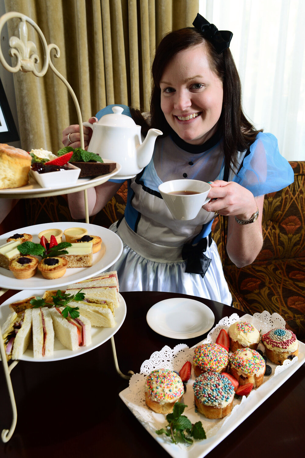 Metro Hotel Ipswich International functions coordinator Kimberley Gent hosting a Mad Hatter's Tea Party to raise money for cancer research, Ipswich, 17th May 2013