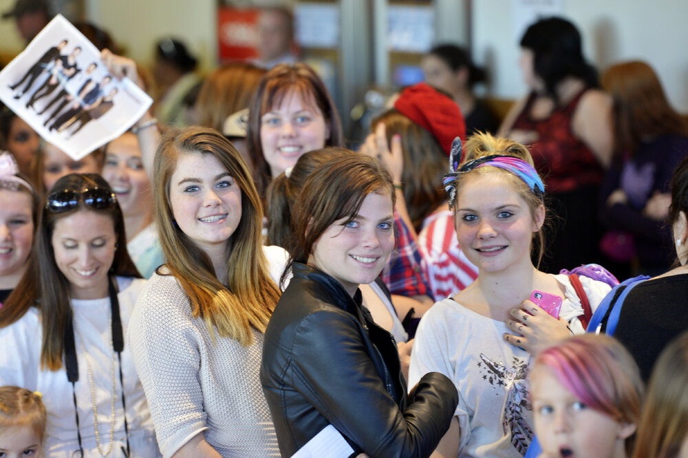 Fans of The Collective wait at Riverlink Shopping Centre, Ipswich, 17 May 2013