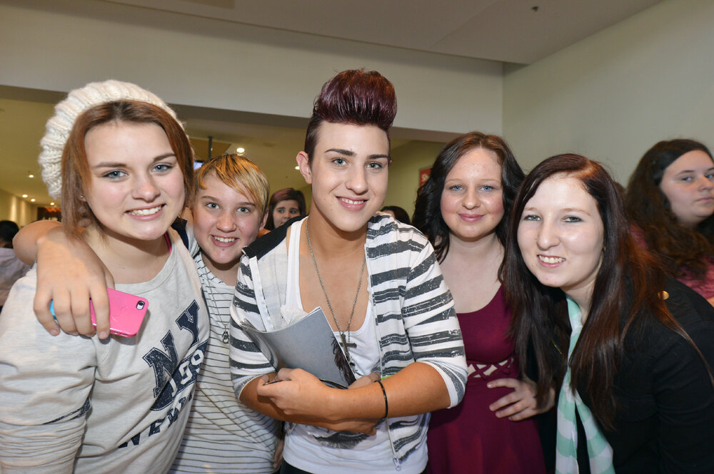 Deanna Murphy, 13, josh and Brandon Reichle, 12 and 15, Chanelle Jones, 15, and Tori Watson, 18, wait for The Collective at Riverlink Shopping Centre, Ipswich, 17 May 2013