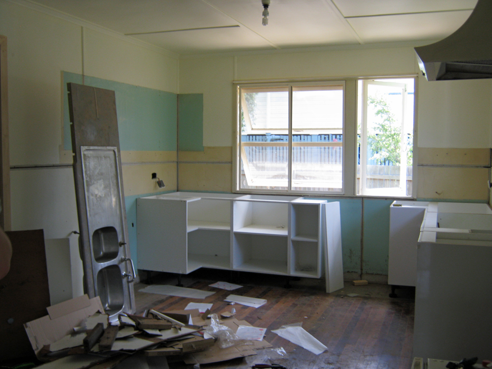 Replacing kitchen in flood damaged home, Brassall, Ipswich, 2011