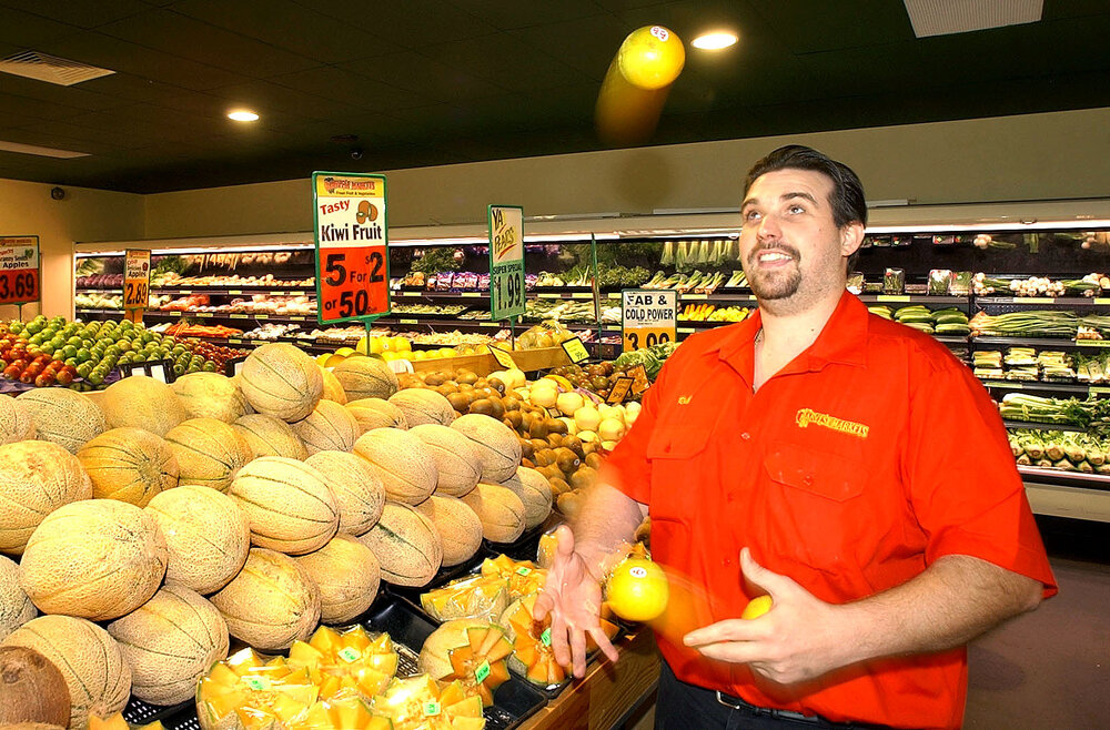 Rob Sayle juggles his inventory at the Yamanto outlet of Harvest Market, Ipswich, 2 February 2005