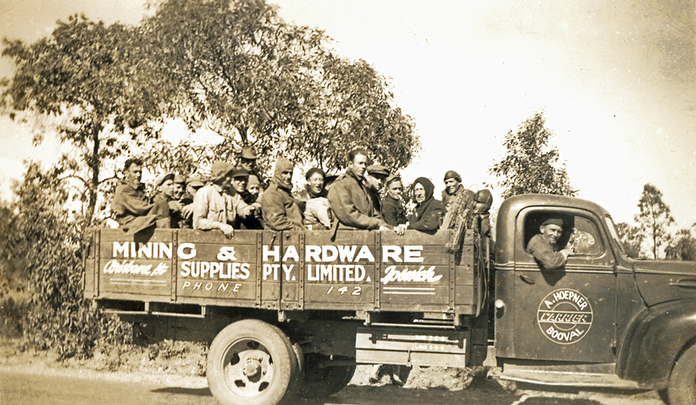 Unidentified group of people in an A. Hoepner truck, Ipswich, late 1920s