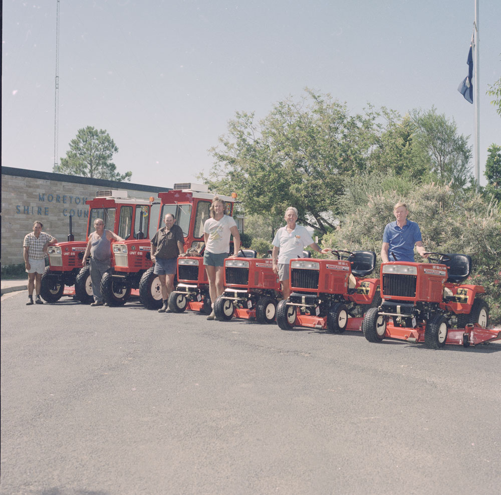 Moreton Shire Council staff with mowers, Yamanto, Ipswich, 1989