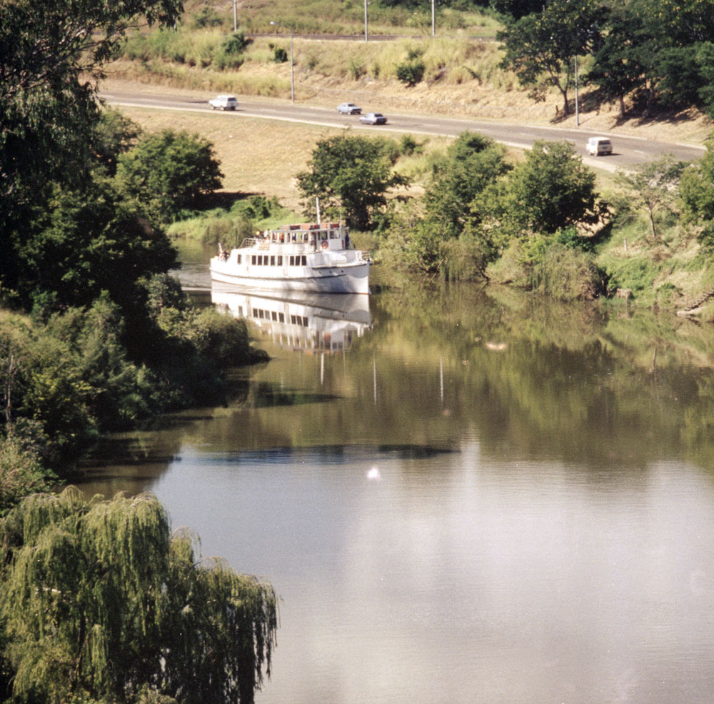 Boat coming up Bremer River alongside King Edward Parade, Ipswich, 1991