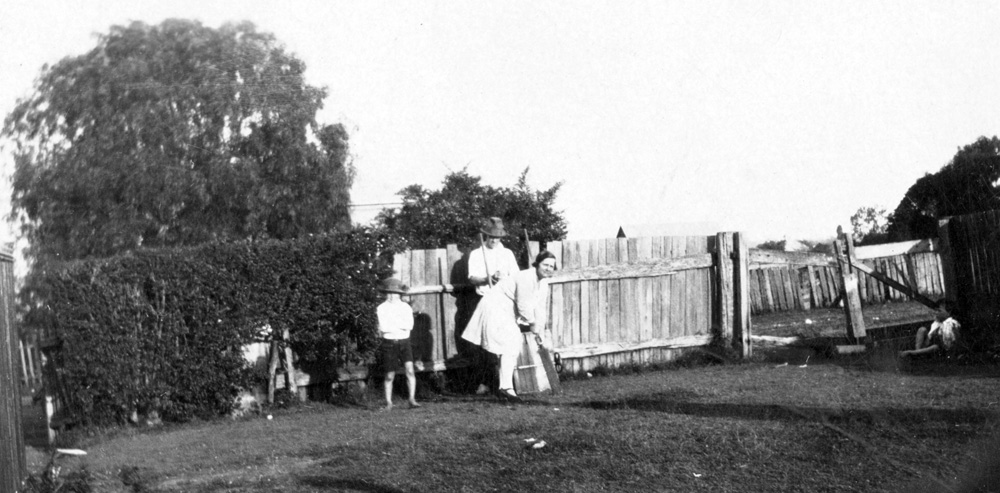 Cricket in the backyard, Ipswich, 1920s