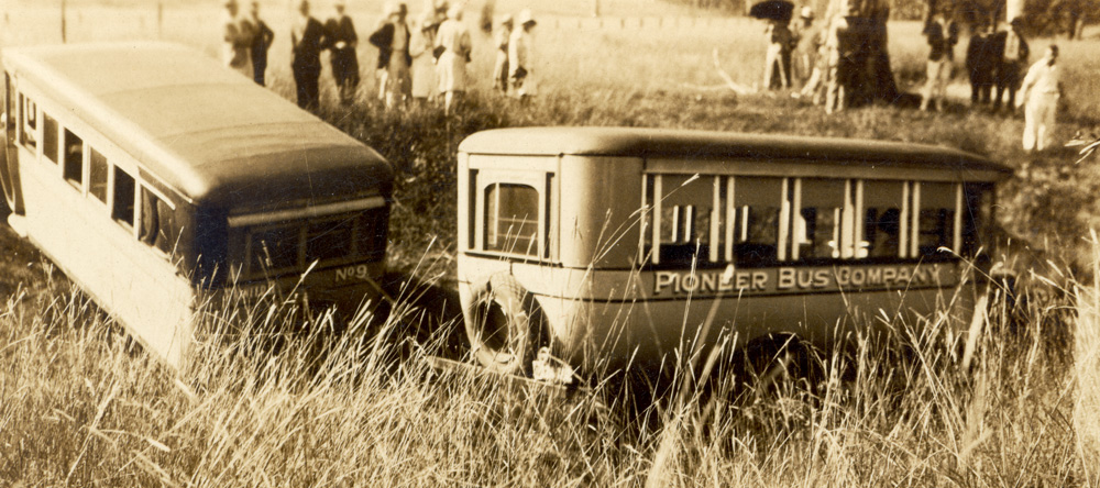 Pioneer buses bogged during a day out at Lake Manchester for QT employees, in the mid 1920s