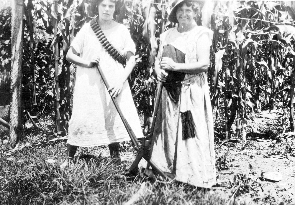 Unidentified women in corn fields, 1920s