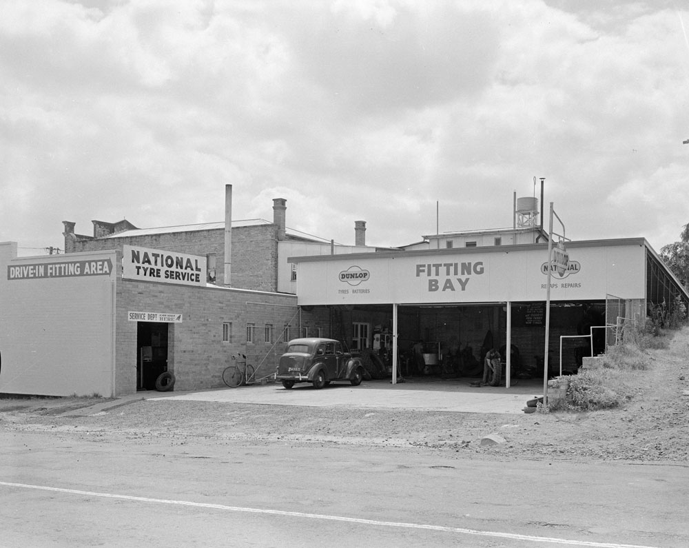 National Tyre Service, fitting bay, 40-42 Brisbane Street, corner of Gordon Street, Ipswich, 1960
