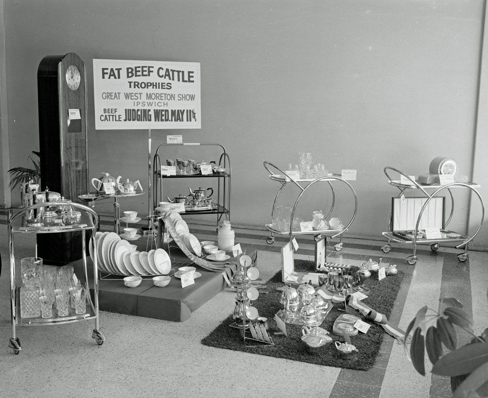 Faulkner Motors Showroom, 154 Brisbane Street, displaying Ipswich Show trophies, Ipswich, 1960