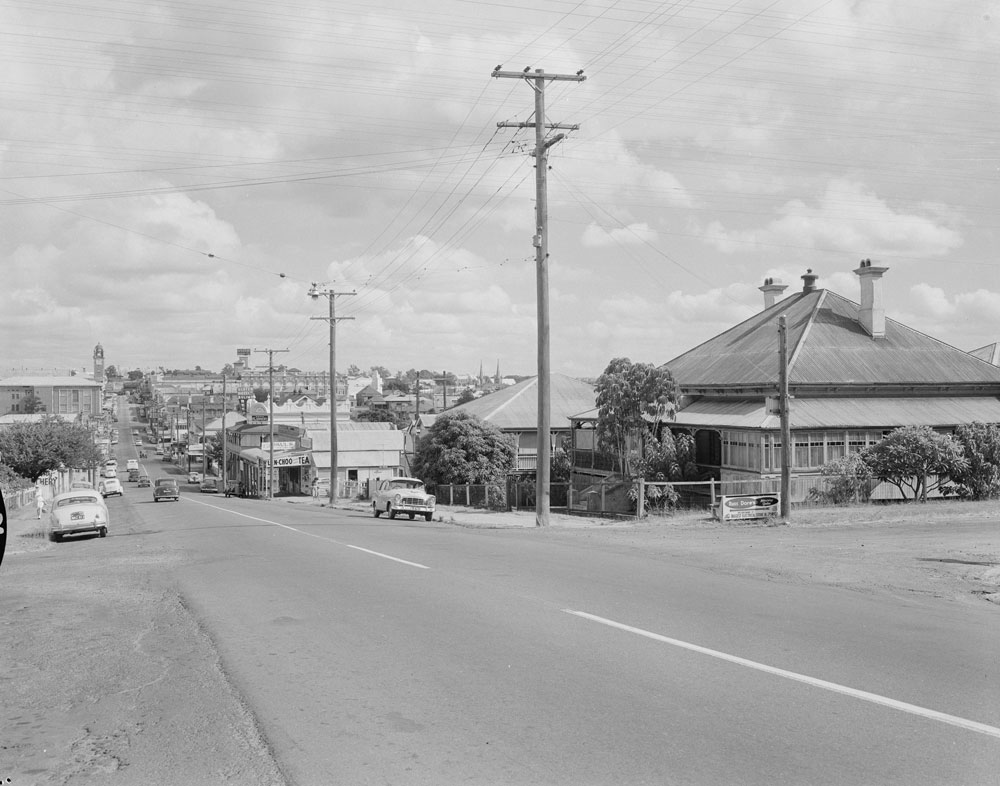 Brisbane Street streetscape, looking west from corner of Brisbane and Thorn Streets, Ipswich, 1961.