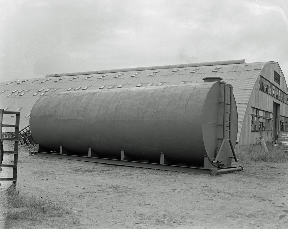 Hydraulic Plant and Engineering Co. tank, thought to be on site of World War 2 Army Depot, River Road, No. 64, Redbank, Ipswich, 1961