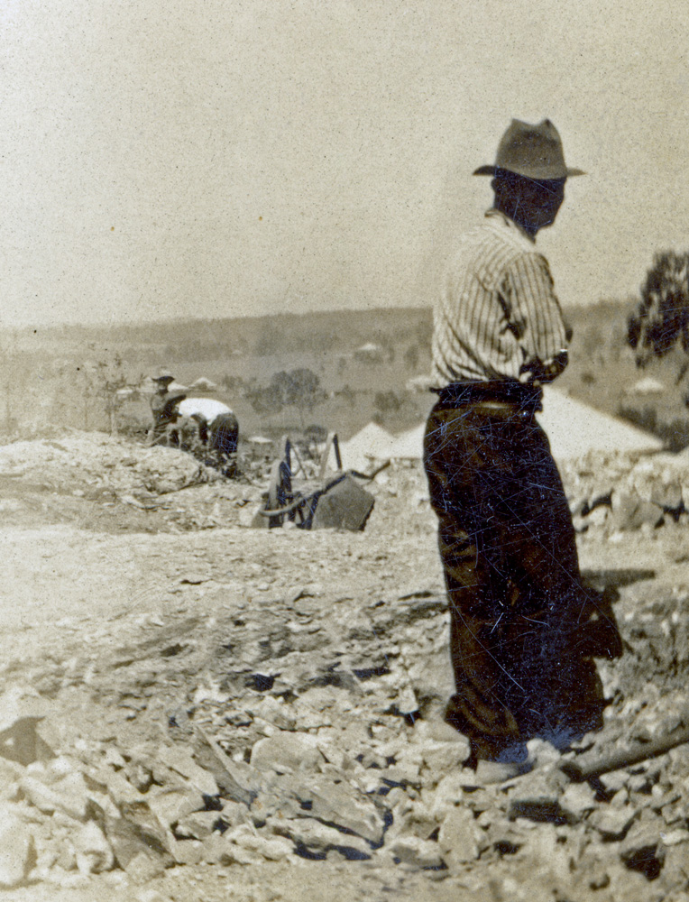 Unidentified man working on constructing a cutting on Pine Mountain Road, North Ipswich, during the Depression ,1930s