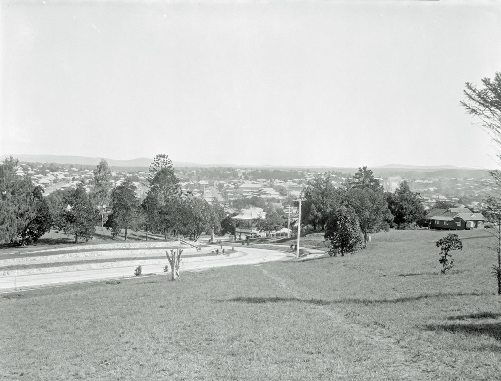 View of Ipswich from Queens Park with band rotunda and kiosk in foreground, Ipswich, 1930s
