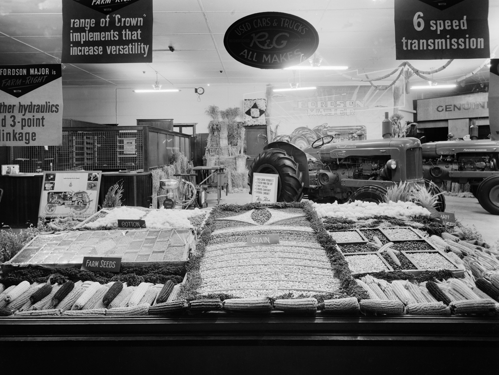 Modern Motors produce display as part of  Fordson Major Tractor display, cnr Gordon &amp; Brisbane Street, 1952