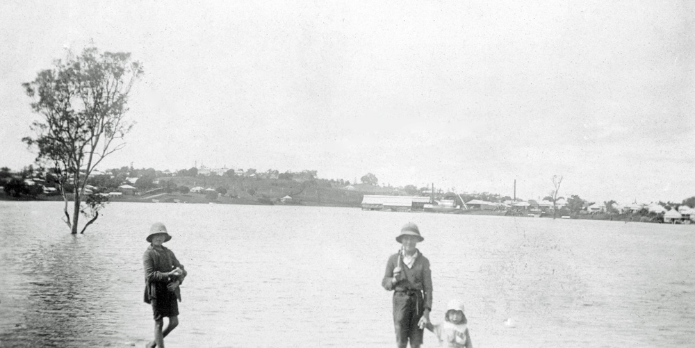 Bremer River in flood with Hancocks Sawmill visible in the distance, 1931