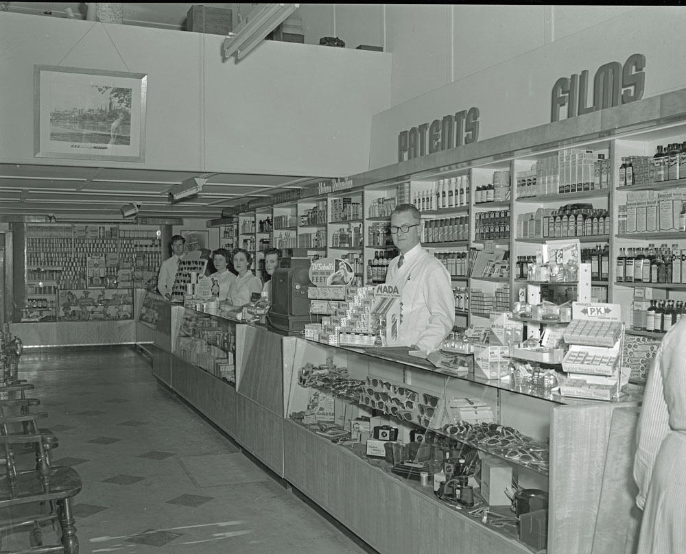Staff in Nolan's Pharmacy, corner of Brisbane and Nicholas Streets, Ipswich, 1955