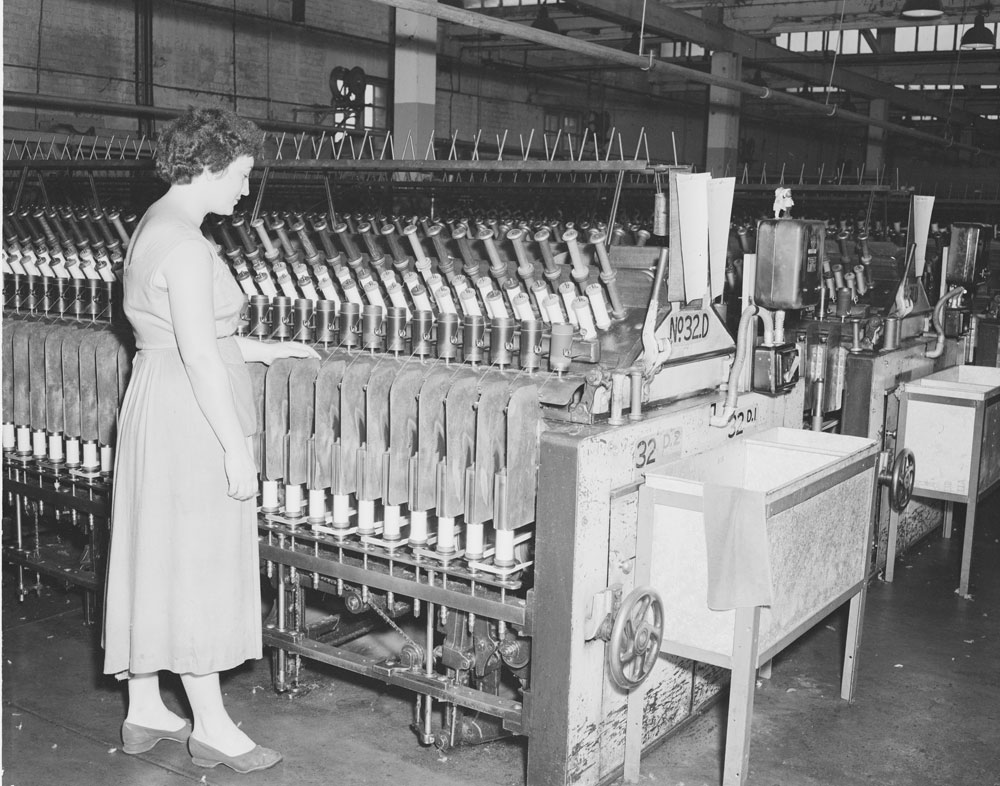 Worker operating the Spinning Mules at the Ipswich Woollen Mills, Joyce Street, East Ipswich, 1956