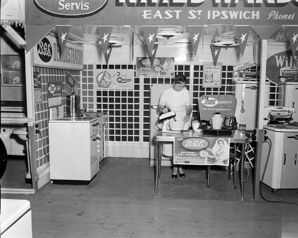 Staff demonstrating a BGE mixmaster at the R.T. Edwards &amp; Sons electrical appliance display stand at the Ipswich Show, Ipswich, 1957
