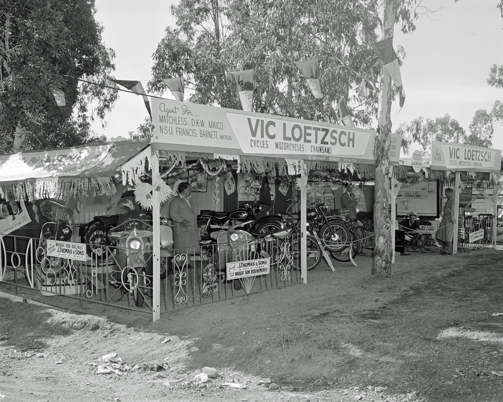 Vic Loetzsch Cycles, Motorcycles &amp; Chainsaws display, Ipswich Show, Ipswich, 1957
