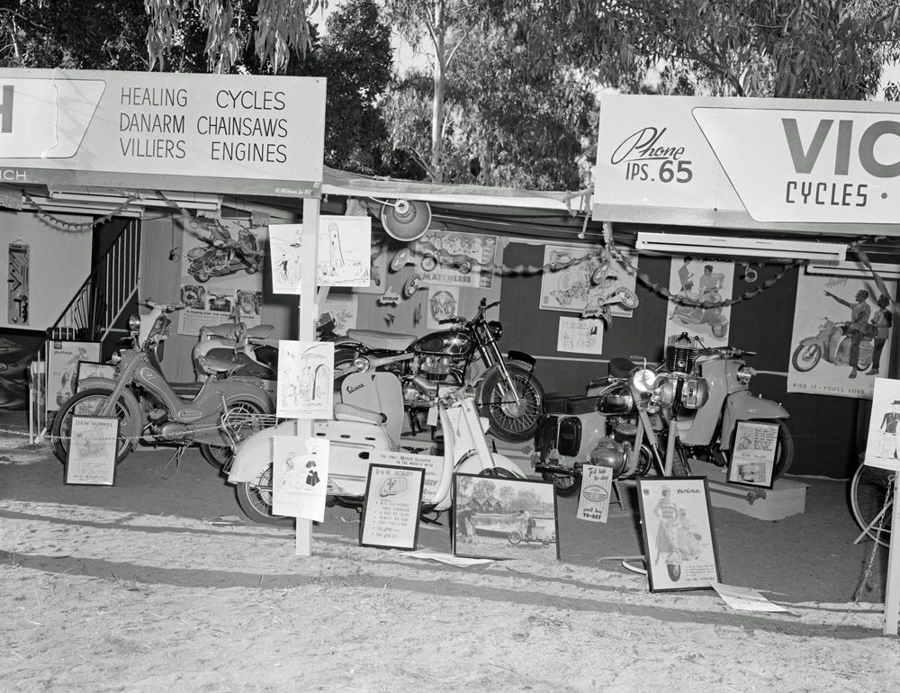 Vic Loetzsch Cycles, Motorcycles &amp; Chainsaws display at the Ipswich Show, Ipswich, 1958