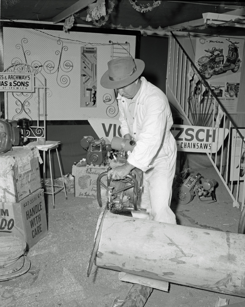 Vic Loetzsch Cycles, Motorcycles &amp; Chainsaws display at the Ipswich Show, Ipswich, 1958