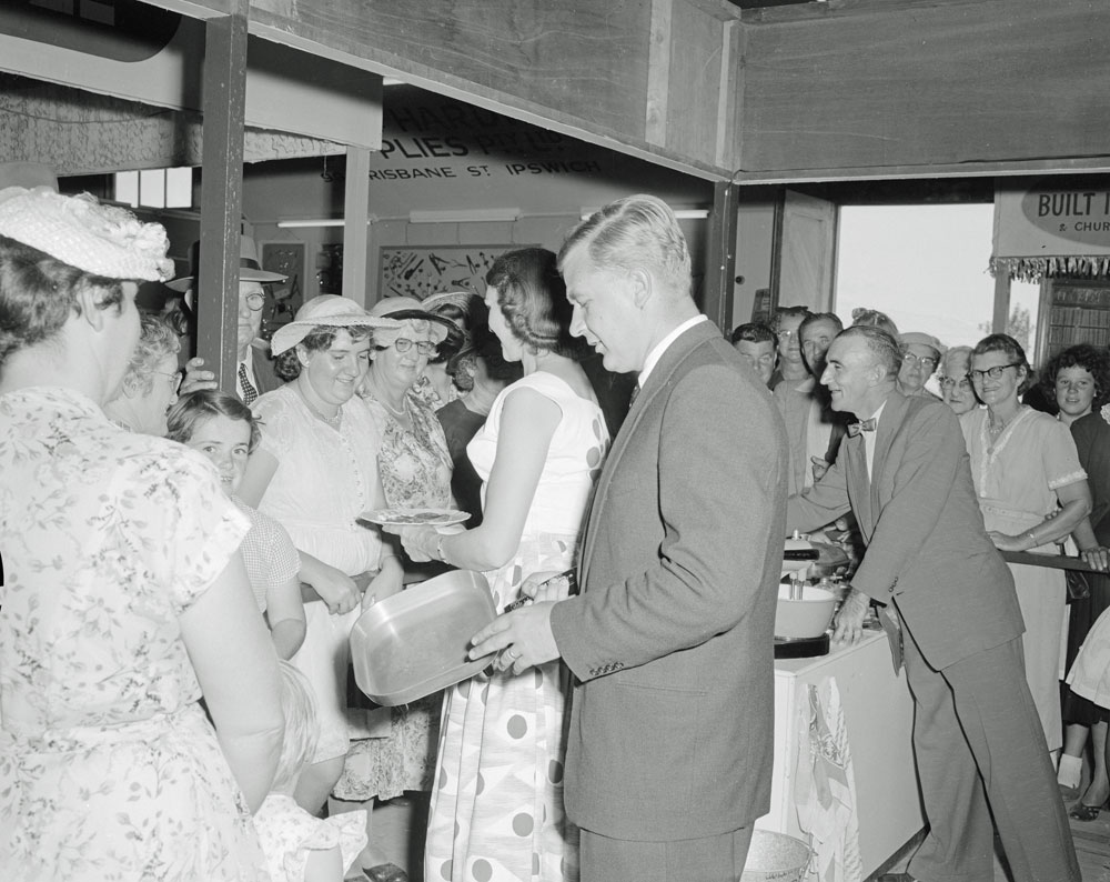 R.T. Edwards &amp; Sons staff demonstrating electrical kitchen appliances at the their Ipswich show display, Ipswich, 1958
