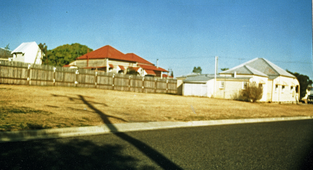 Dwyer Street looking to rear of homes at 12 and 14 Morris Street, Silkstone, Ipswich|Ipswich, Queensland, 1991