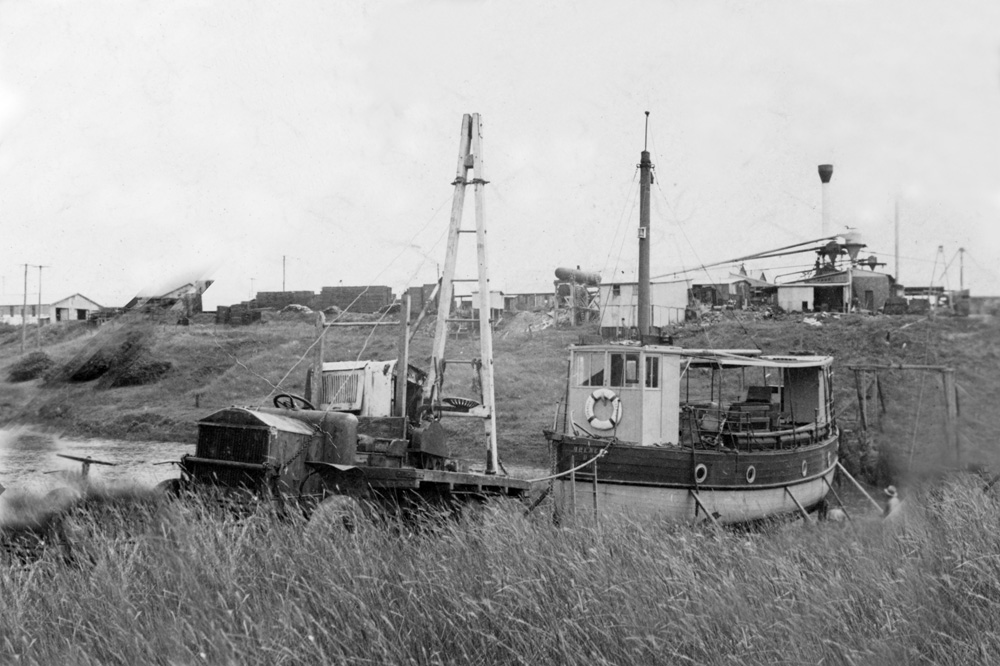 Truck with crane on back beside the Bremer (boat), Ipswich,1940s