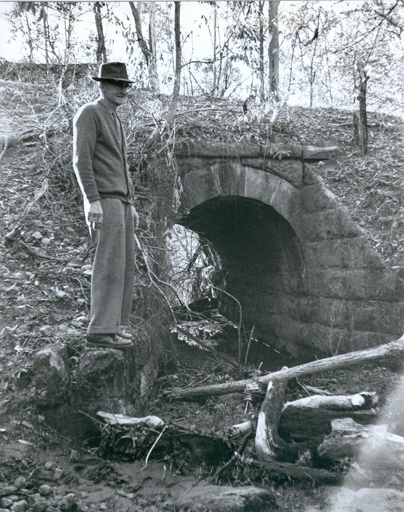 Wulkuraka Station Master at a culvert at Wulkuraka, Ipswich|Ipswich, Queensland, 1965