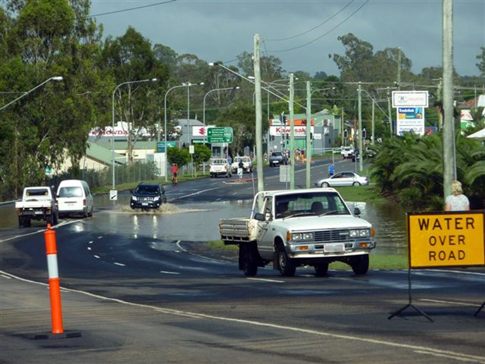 Water rising on Moffatt Street during flood, One Mile, Ipswich, 2011