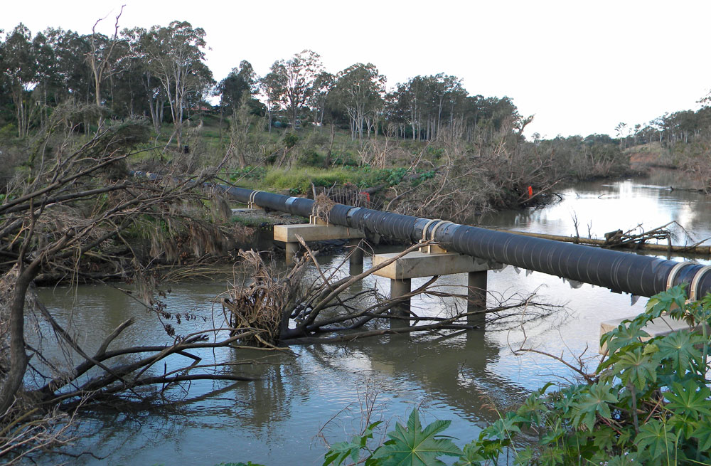 Debris under pipes at Colleges Crossing, Chuwar, Ipswich, 2011