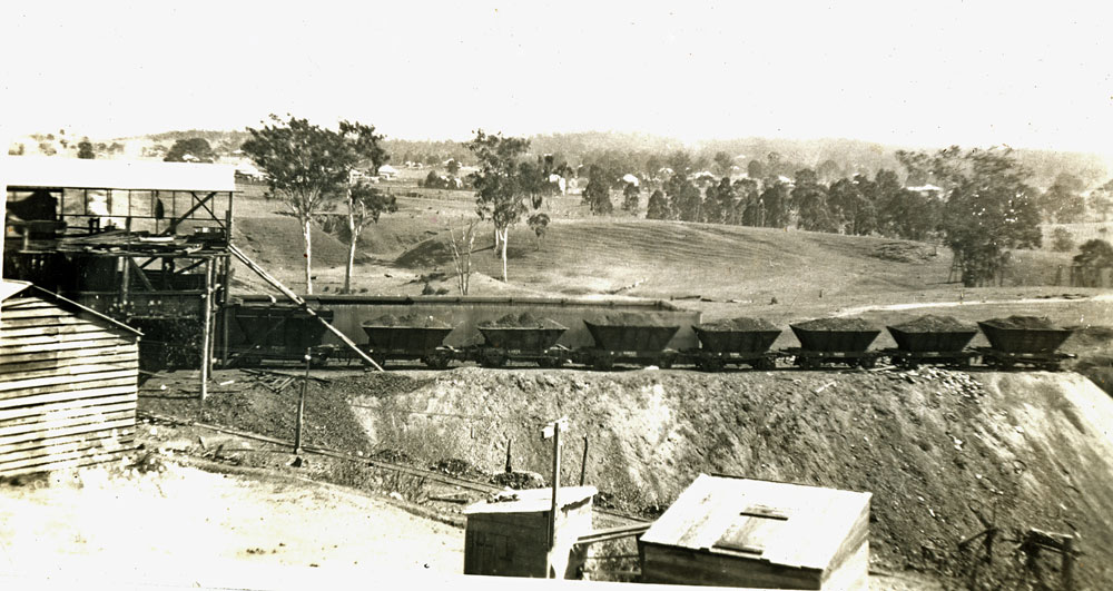 Gantry and wagons on slag heap at Klondyke Colliery, North Ipswich, c.1928