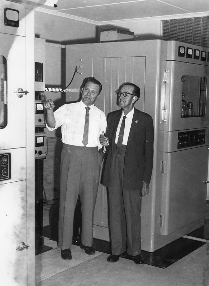 William Johnson (Managing Director) believed to be with Keith Fairweather, chief engineer at the 4IP Radio Station transmitter room, Briggs Road, Ipswich, 1960