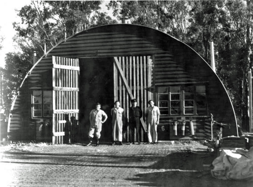 Air Force personnel outside a workshop hangar at the Amberley Air Force Base, Ipswich, 1940s