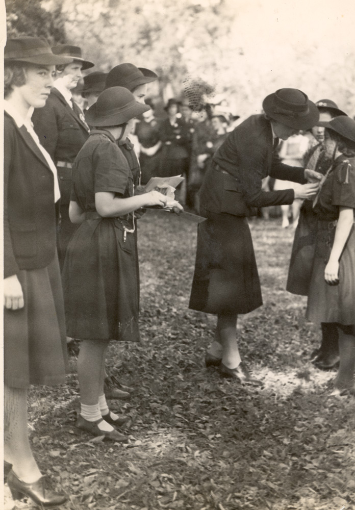 Betty Newell being enrolled as a Girl Guide, Ipswich, 1945