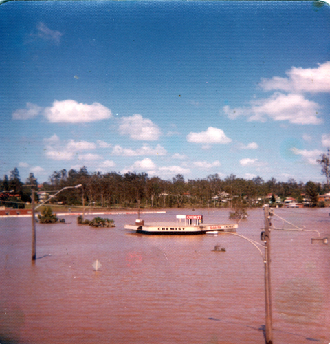 Roof of Chemist, during flood, Goodna, Ipswich, 1974