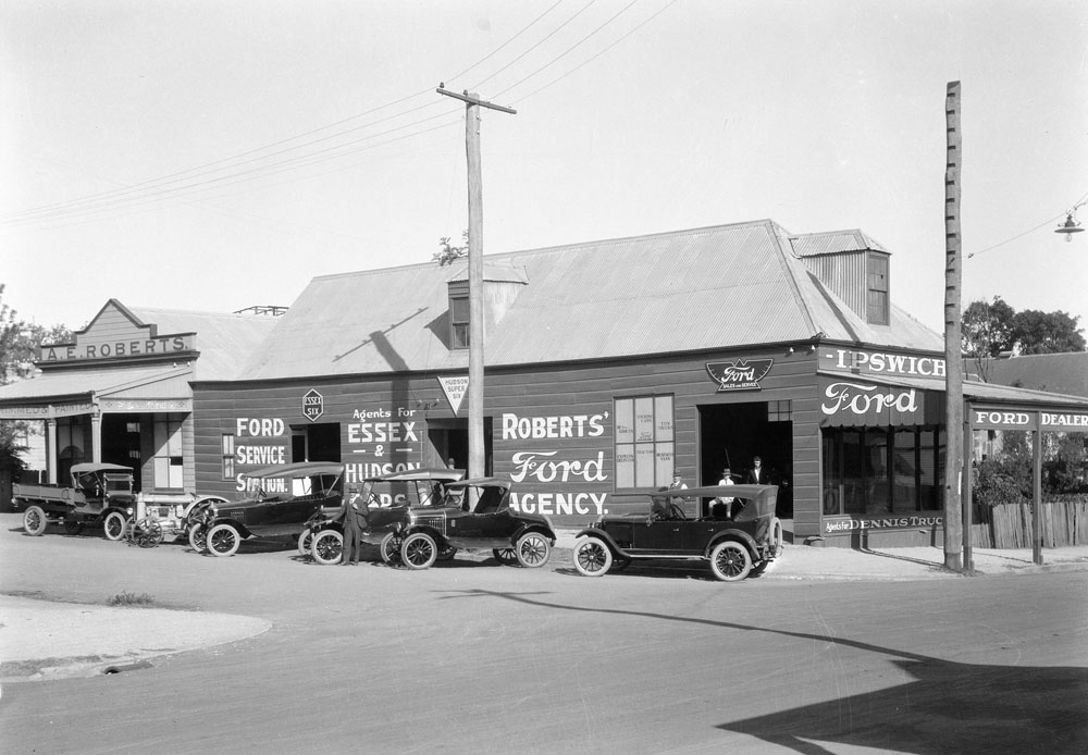 Motor vehicles outside of A. E. Roberts' at the corner of Gordon and Brisbane Streets, Ipswich, 1924