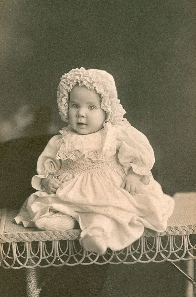 Image of  infant in elaborate dress, Ipswich, early 1900s
